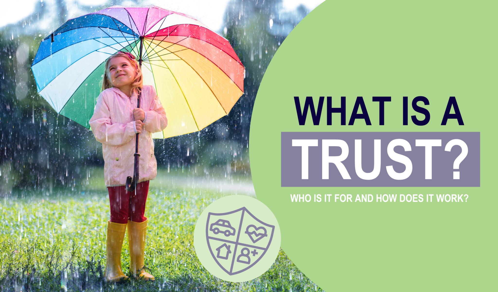 Little girl standing under a colourful umbrella in the rain